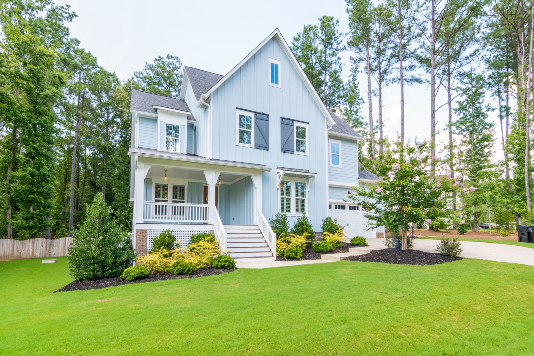 Lap-style fiber-cement siding repaint inspiration with minimal masonry